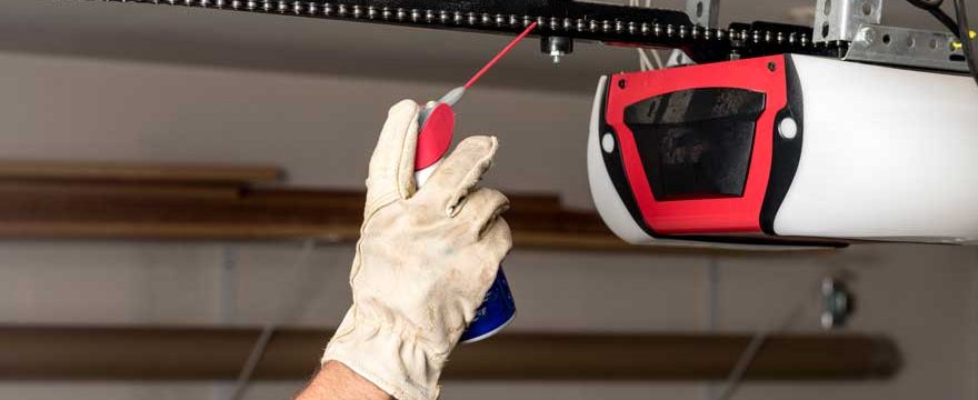 Applying oil to a garage door chain