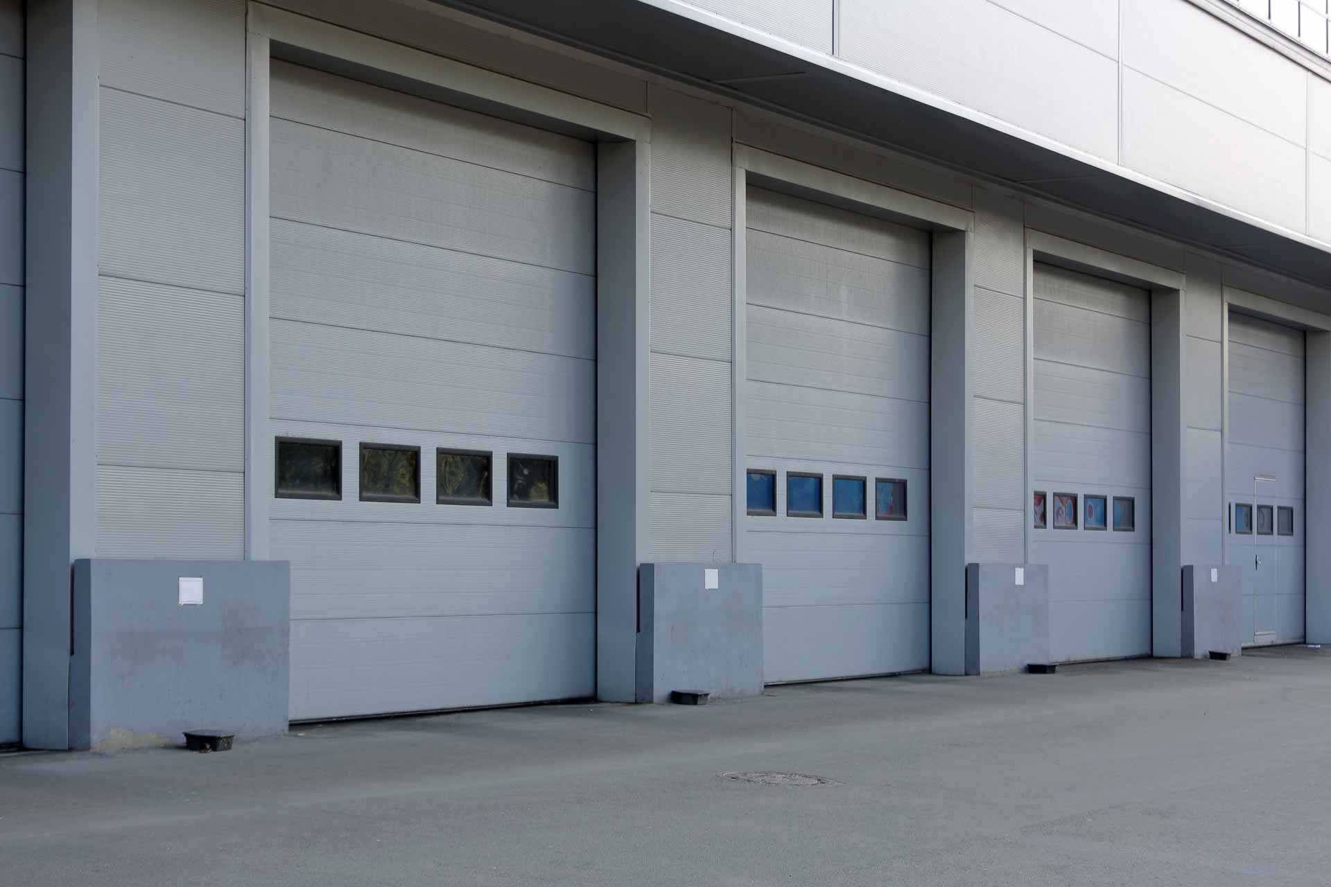 Commercial garage with grey garage doors